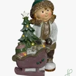 Bambino con Slitta e Luci