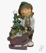 Bambino con Slitta e Luci